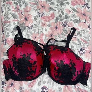 TORRID Curve Bra, black lace over red satin, with cross back straps. 46DD